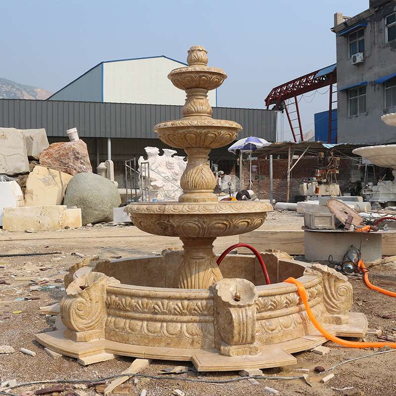 供应黄色大理石喷泉 大型海螺造型石雕广场装饰流水石雕喷泉厂家