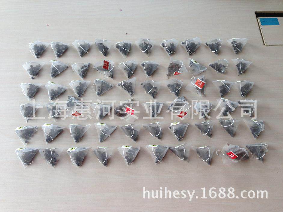 供应多种花草茶包装机电子称茶叶分装机三角尼龙袋茶叶包装机