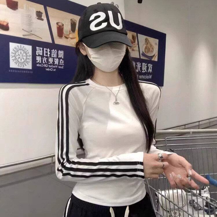 美式辣妹条纹白色长袖T恤女春秋2026撞色修身插肩内搭打底衫上衣