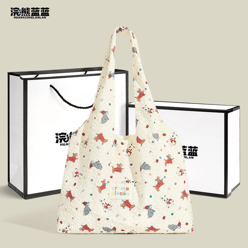 浣熊蓝蓝可爱卡通小狗帆布包女2026新款清新上班通勤单肩包手提袋