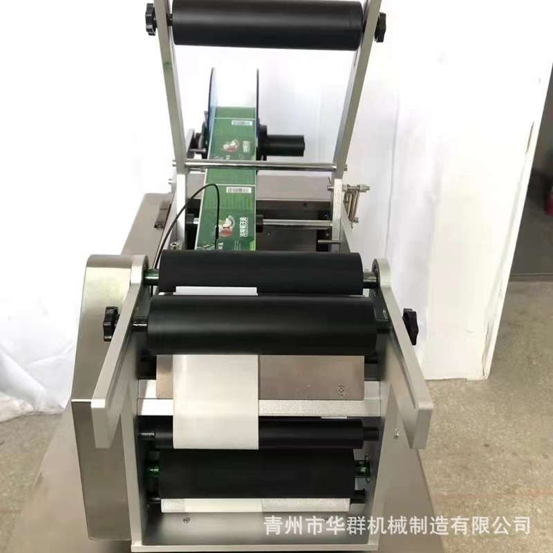 消毒液半自动圆瓶贴标机 圆罐不干胶标签贴标机 手持圆瓶贴标机