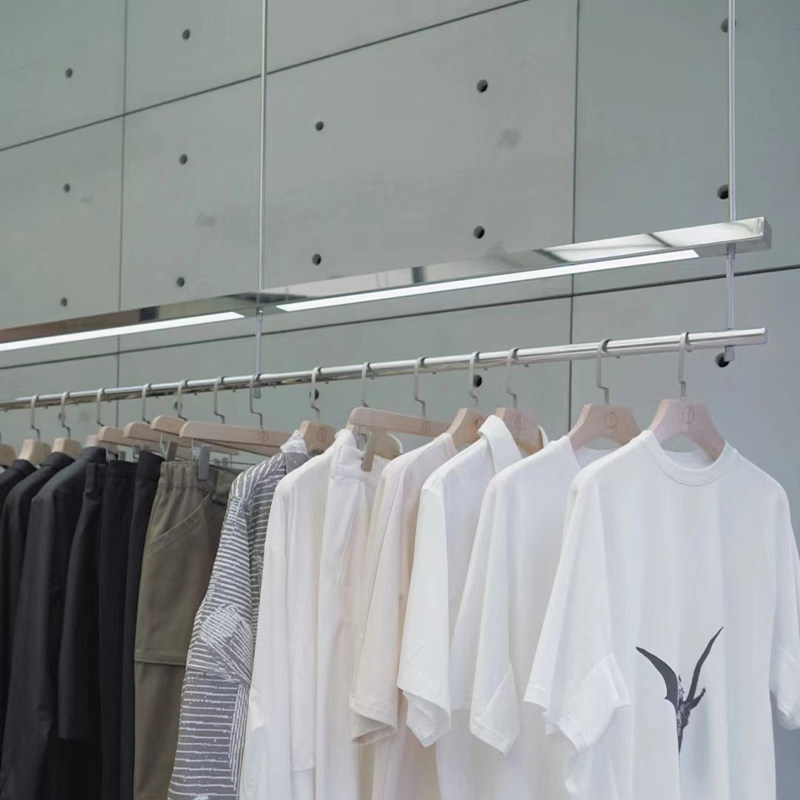 服装店展示架带灯钢丝吊挂高档不锈钢壁挂式陈列架女装店橱窗吊架