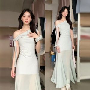 法式绿色网纱拼接连衣裙子女夏季2026新款气质绝美感包臀长裙