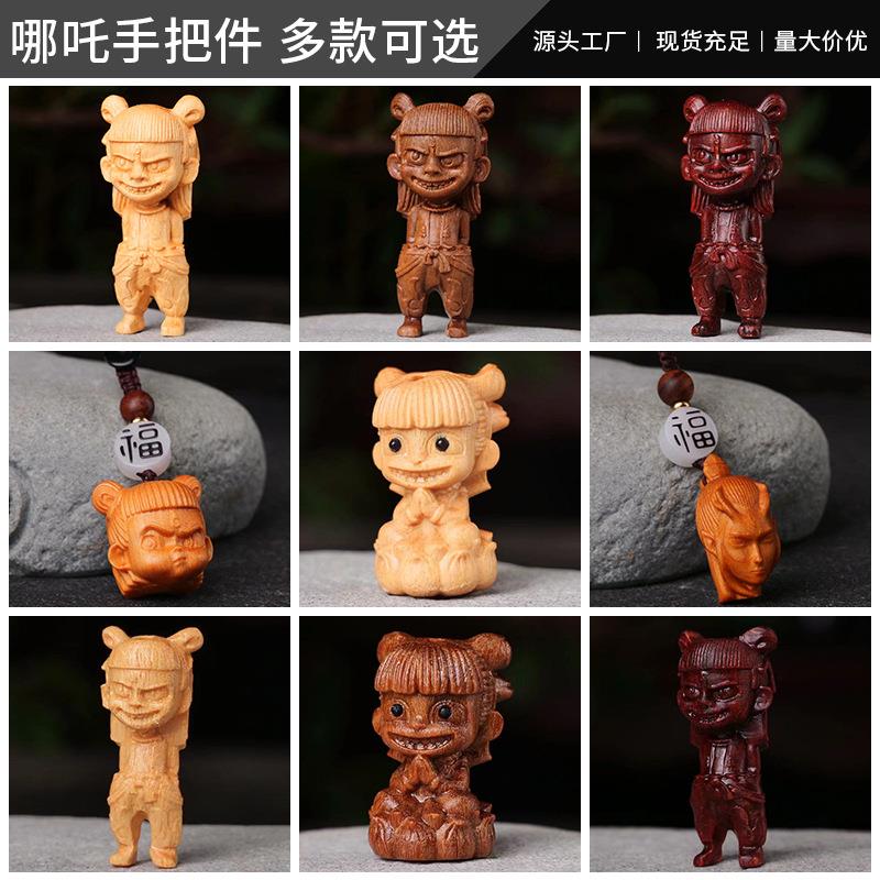 崖柏木雕龇牙哪吒三太子办公桌面木雕