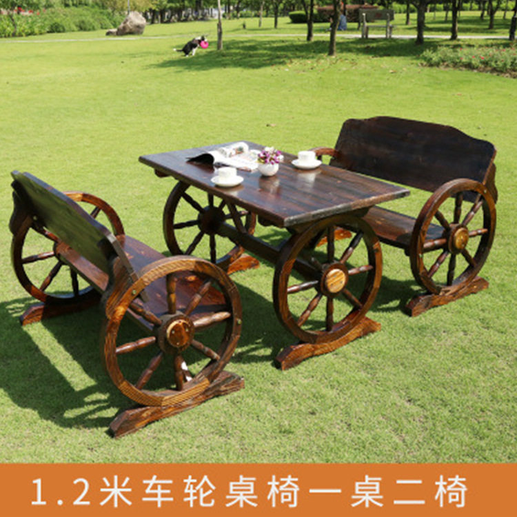 户外桌椅酒吧庭院休闲实木桌椅碳化木防腐木车轮桌椅组合图片