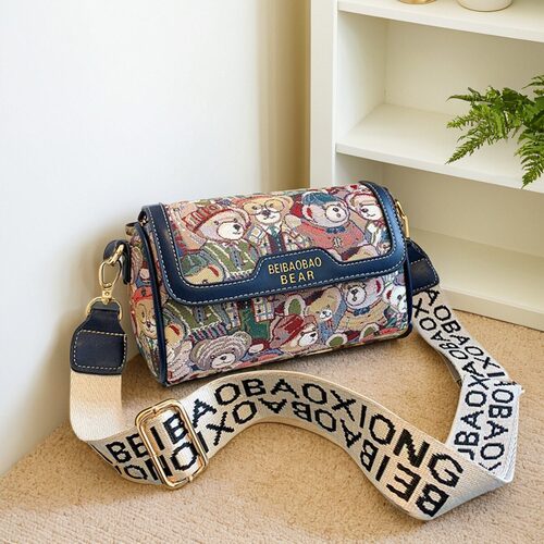 小众设计卡通帆布背包圆筒斜挎包