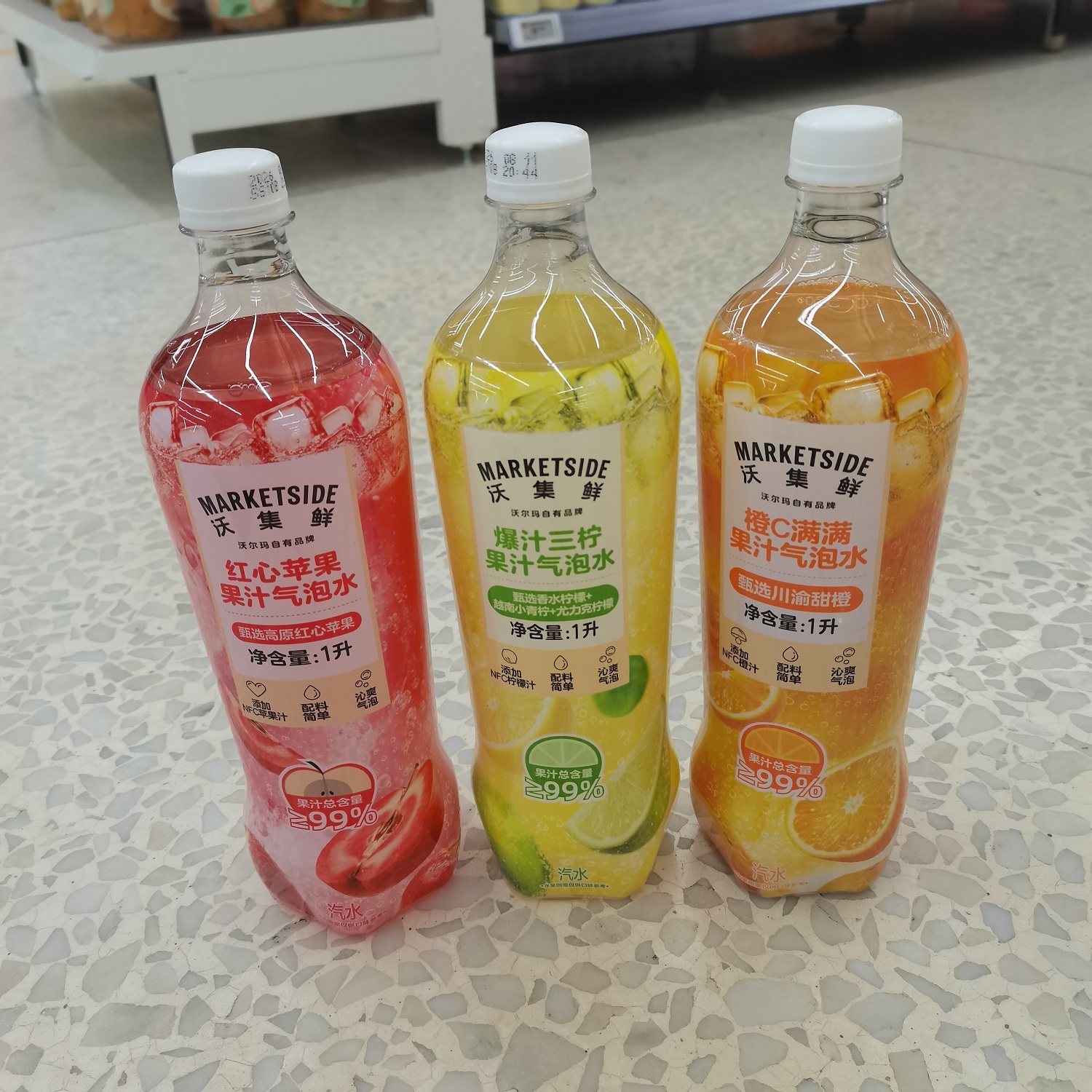 沃集鲜果汁气泡水1L家庭装苹果橙C爆汁三柠檬味沃尔玛代购饮料
