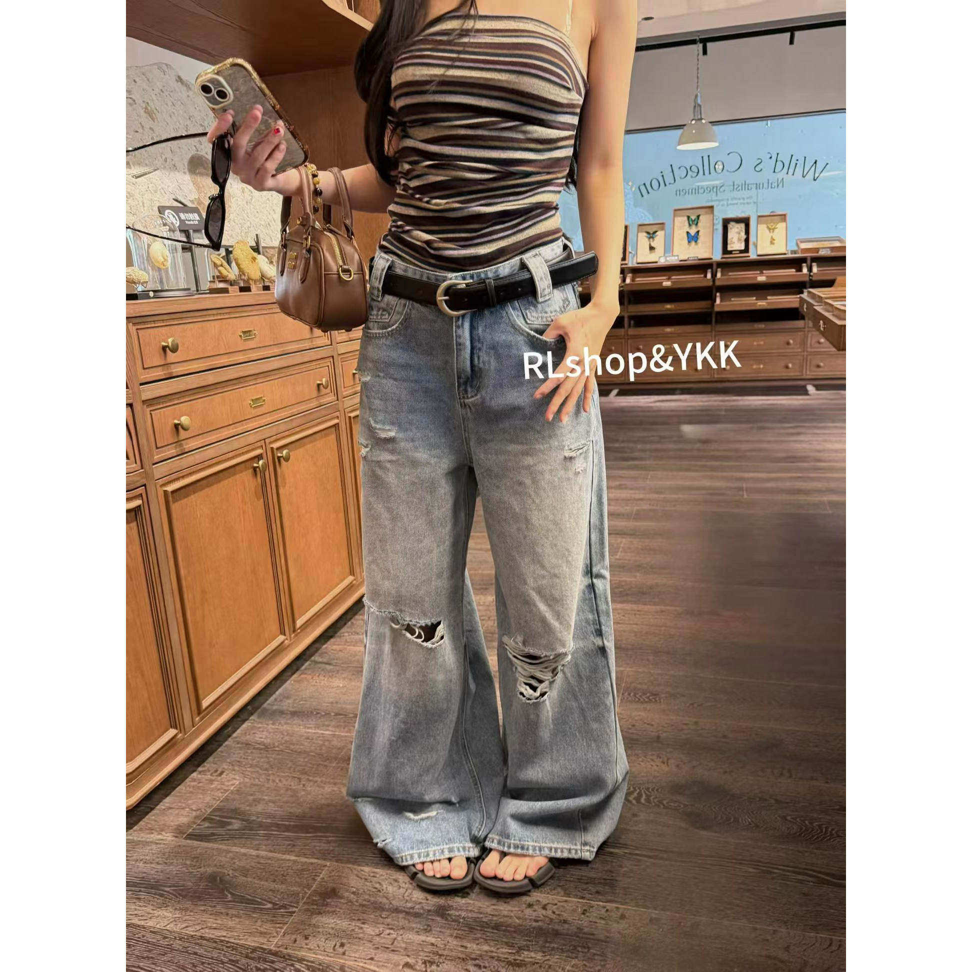 浅蓝色美式复古破洞牛仔裤女2026春季高腰阔腿长裤设计感水洗裤子