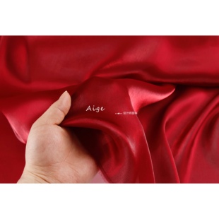 细腻半透星光光泽感 酒红色欧根纱布料 上衣连衣裙面料