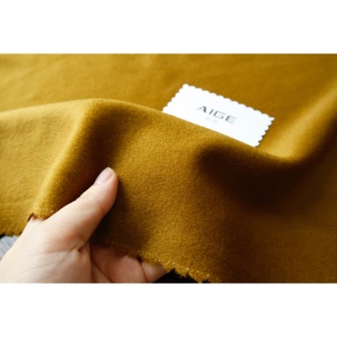 进口 深姜黄色光泽单面顺毛羊绒羊毛毛呢面料秋冬外套大衣布料diy