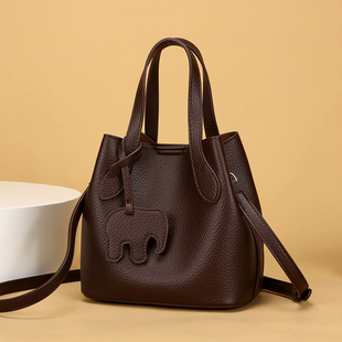 真皮荔枝纹水桶包女2026春新款百搭洋气手提包高级质感单肩斜挎包