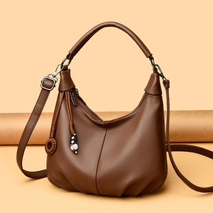 斜挎包包女2025新款大容量托特包慵懒风牛角饺子包软皮上班通勤包