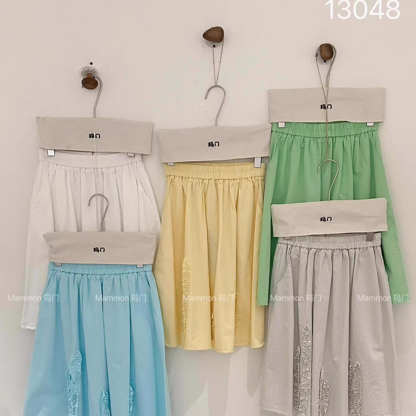玛门2026夏季森系松紧腰糖果色小清新压褶5分裙时尚百搭减龄半裙