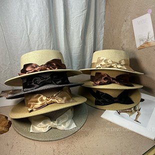 日系简约草编蝴蝶结装饰显脸小草帽夏季新款百搭优雅平顶帽礼帽潮