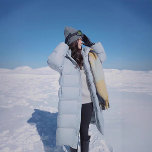 羽绒棉服女2025冬季长款系列连帽过膝女款时尚暖色系舒适棉衣