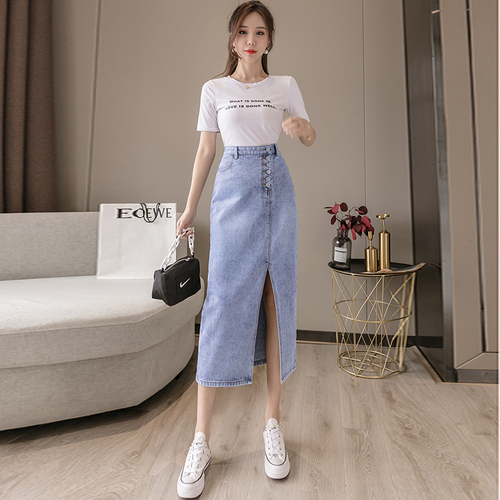 Women's fall 2019 dress with high waist and hip length skirt showing thin denim skirt