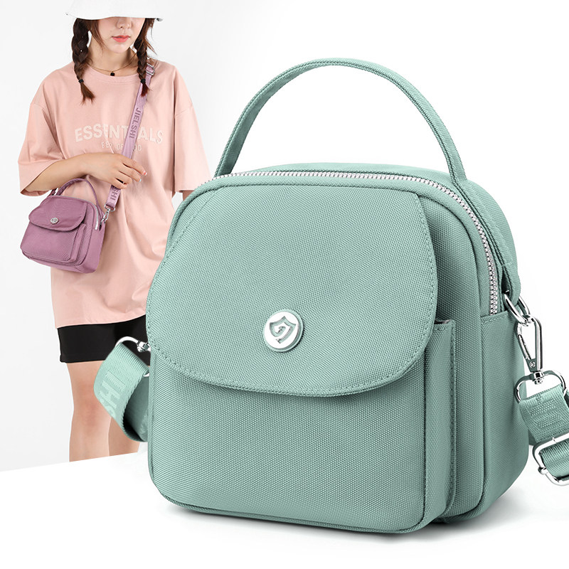 捷朗仕女款轻便帆布22年秋冬新款时尚休闲单肩包贝壳包斜挎单肩包