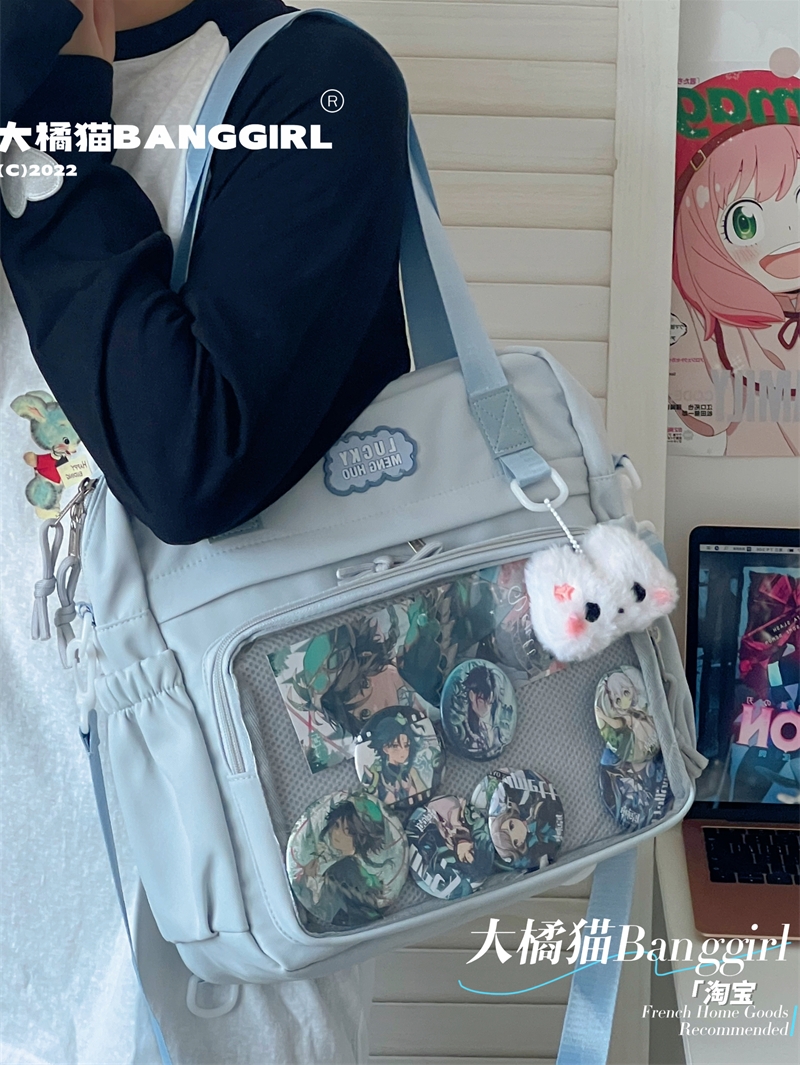 少女大容量吧唧痛包两用双肩包