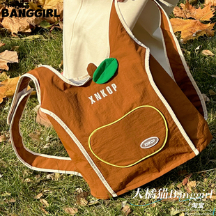 大橘猫苹果马甲双肩背包包可爱红色通勤大容量书包上班旅行背包女