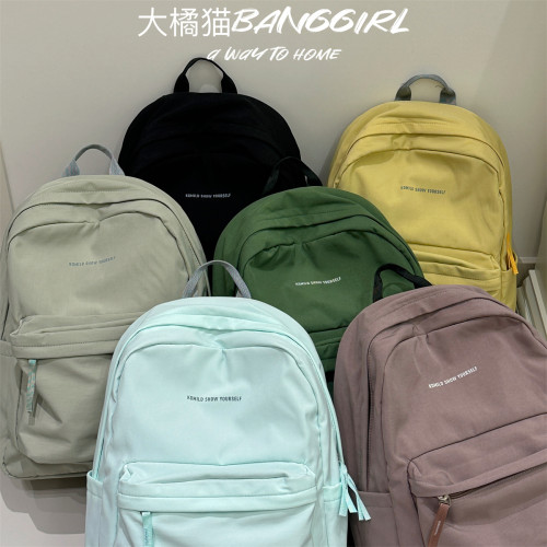 日系ins字母大容量初中生高中生书包旅行防水登山背包简约双肩包