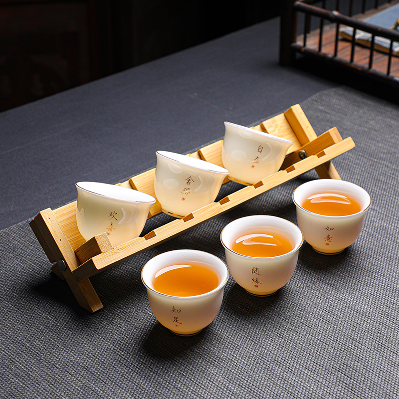 禅字厚胎羊脂玉瓷品茗杯带杯架