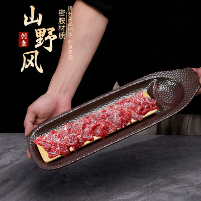 网红创意山野风酸汤火锅店牛肉盘
