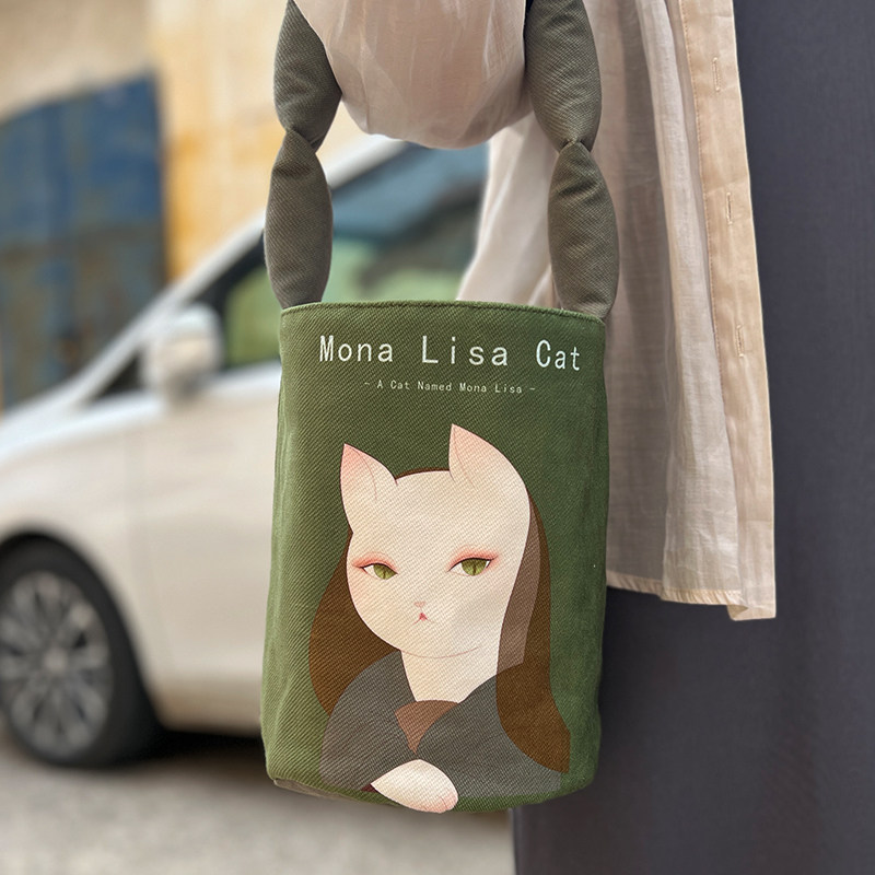 蒙娜丽莎的微笑插画师原创设计肩带手提包女包马蹄水桶包女单肩包,模玩/动漫/周边/娃圈三坑/桌游,动漫背包/钱包/箱包,淘宝优惠券,粉丝福利购,淘宝优惠卷