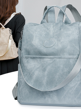 休闲百搭大容量学生双肩包女2024新款通勤风蓝色帆布外出旅行背包