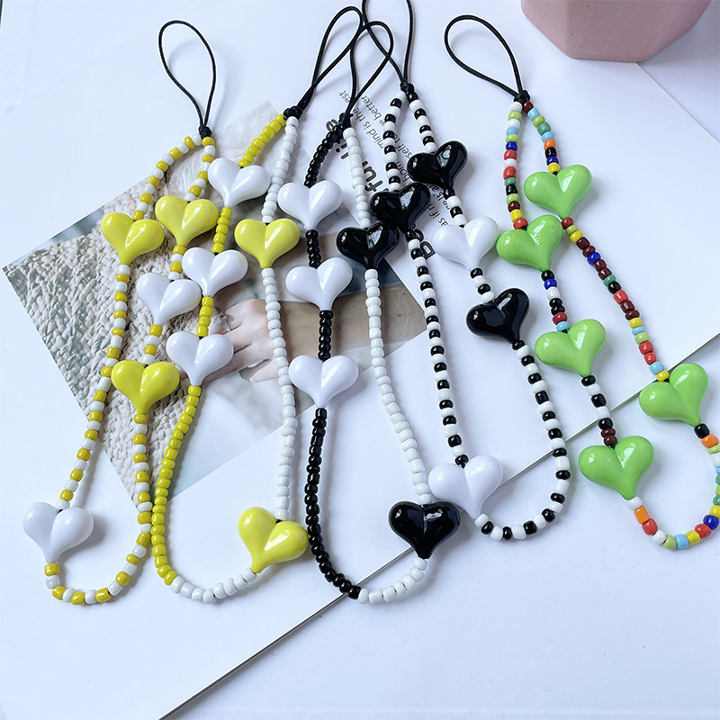 novi新款原创视觉盛宴黑白经典配情侣亚克力爱心手机链短款手腕绳