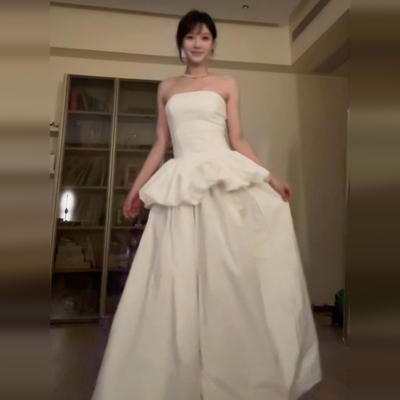 一字肩抹胸白色连衣裙子女夏季2026新款花苞长裙特别漂亮掐腰套装