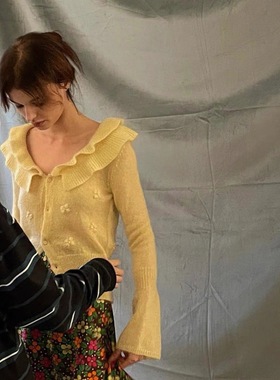 荷叶领黄色针织开衫女2025年新款温柔风小众气质高端甜美短款毛衣