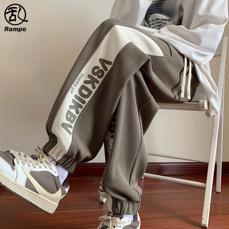 字母拼色卫裤束脚运动裤休闲裤子