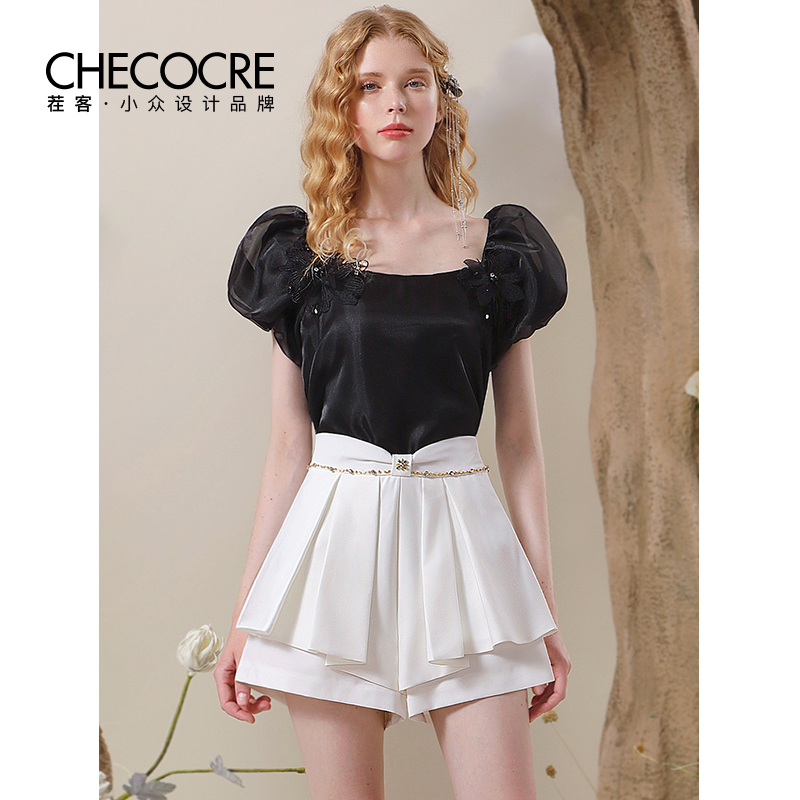 茬客气质感黑色立体花朵上衣