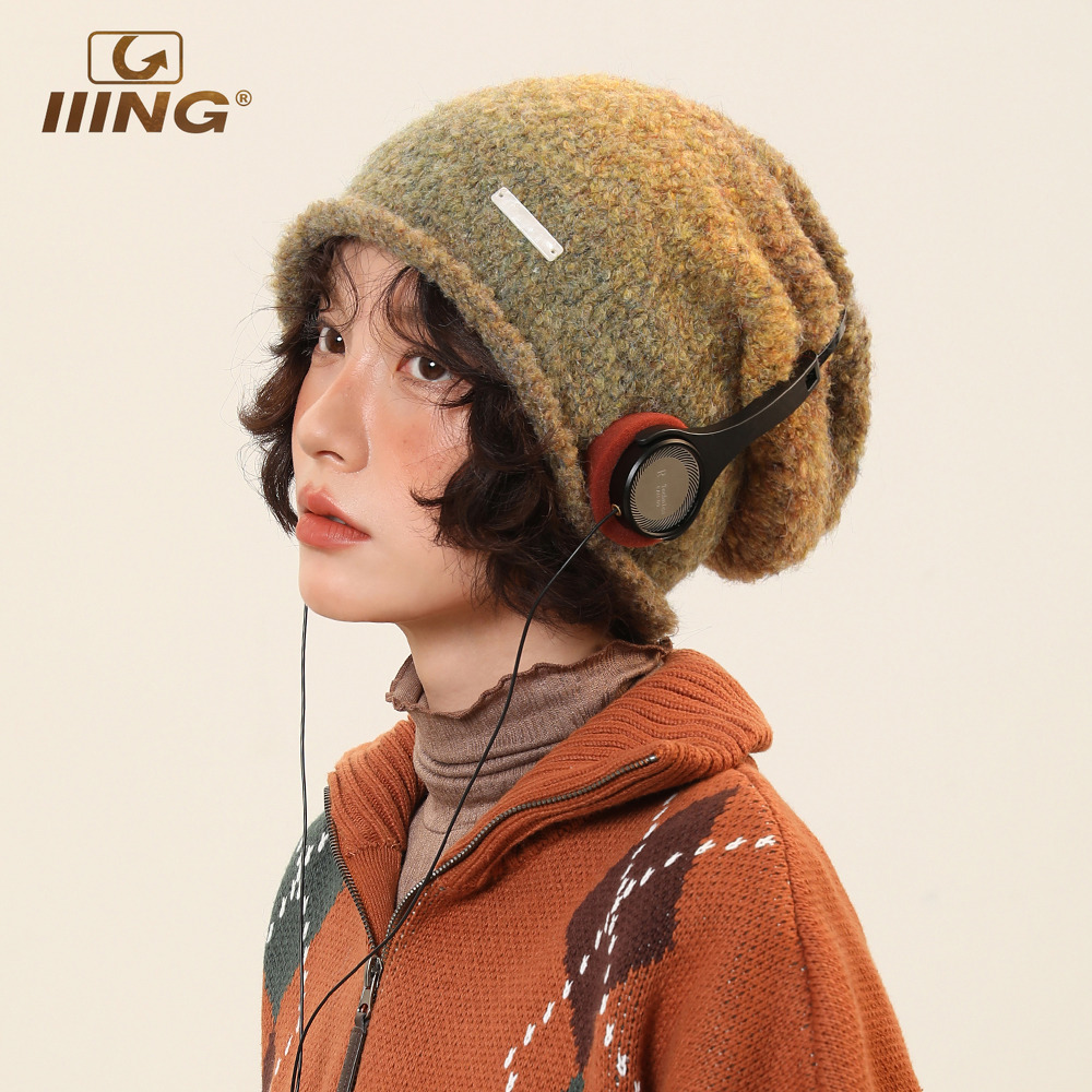 渐变色设计修饰脸型巨显脸小帽子