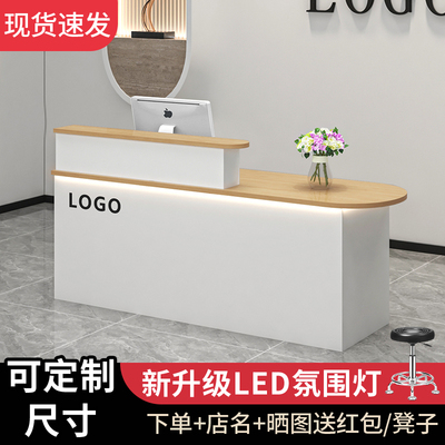 简约带储物柜带灯光吧台收银台