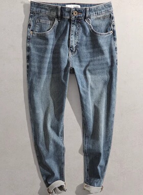 2026春新男显瘦修身弹力复古韩版小脚长裤33159休闲四面弹牛仔裤