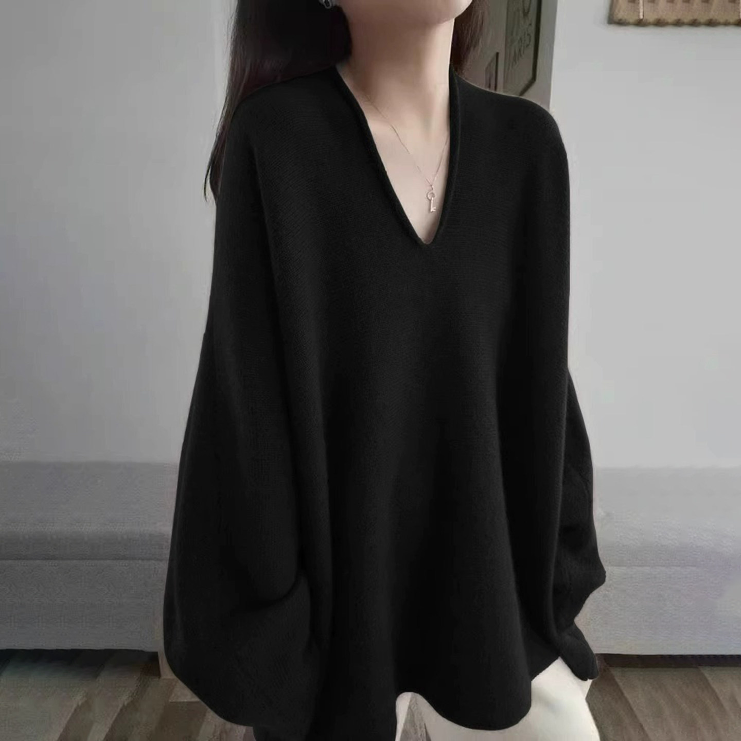 黑色慵懒风中长款v领毛衣女秋冬新款时髦宽松显瘦套头长袖针织衫