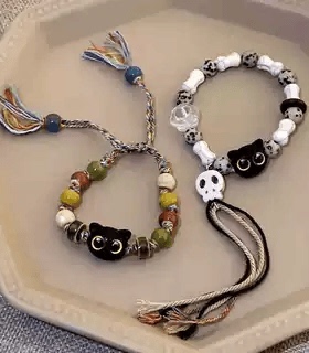 骷髅猫咪编织绳手链女小众设计感甜酷中国风流苏彩色手串手饰