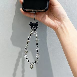 ins风甜酷百搭手机链女黑色蝴蝶结手机壳挂件包包挂饰ccd相机挂绳