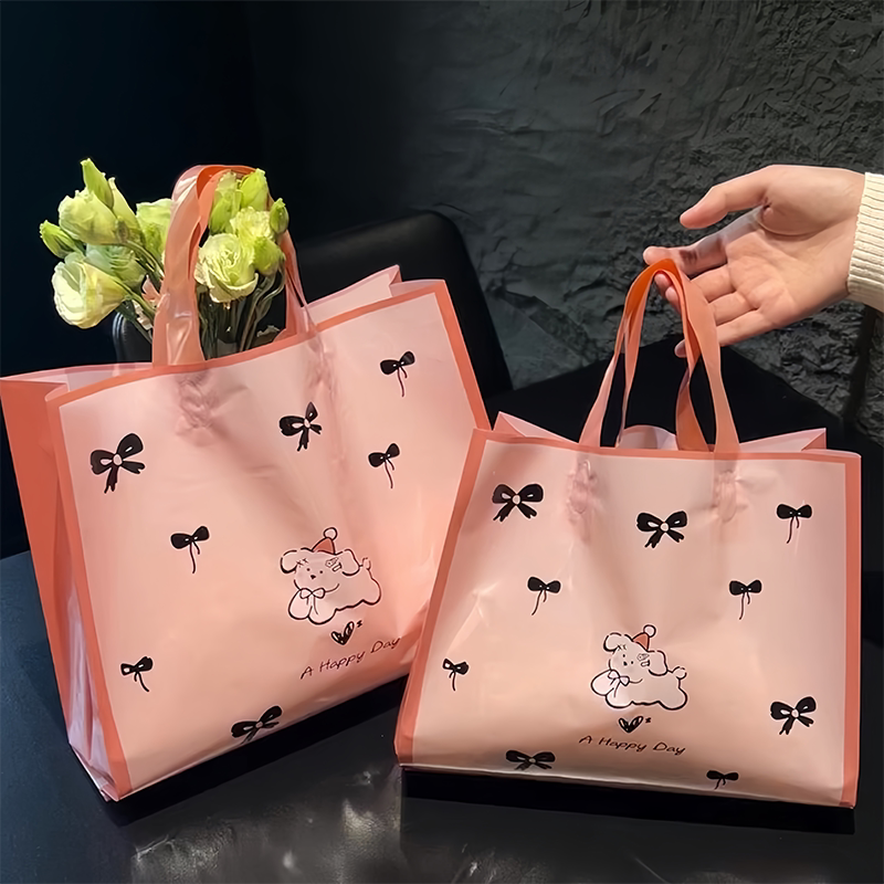 漂亮礼品袋蝴蝶结小狗服装店手提袋礼品袋包装袋女装童装衣服塑料