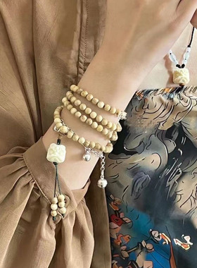 奶香木雕刻醒狮吊坠款多圈手串