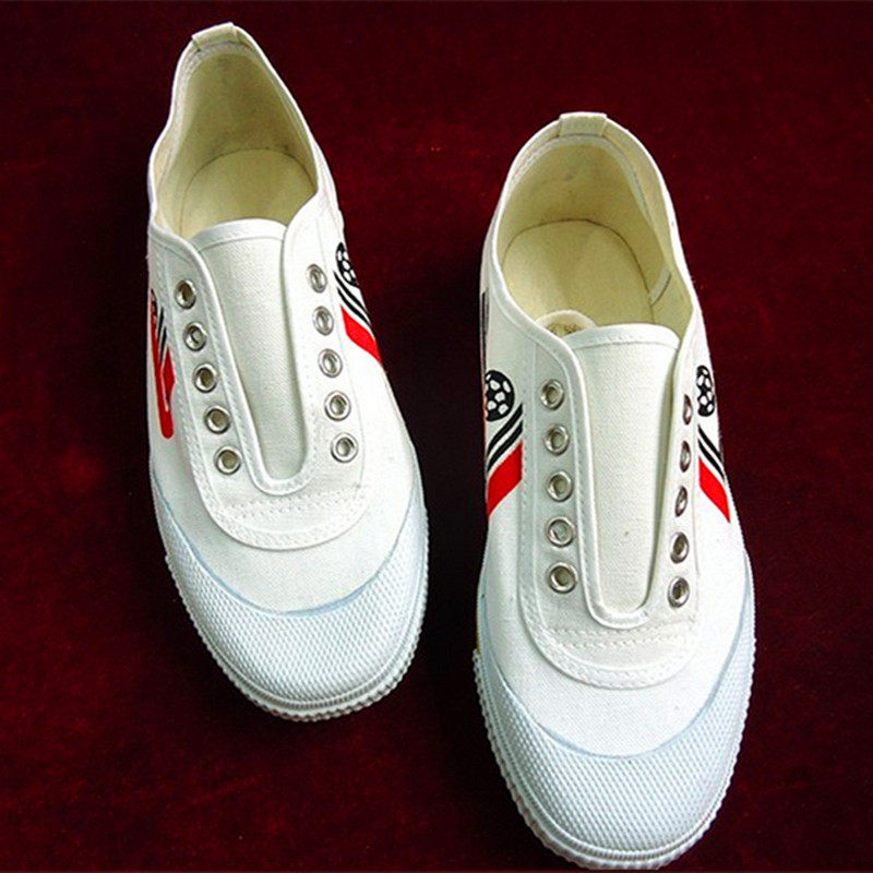 断码青岛工艺平跟足球鞋武术系带跑步学生军训田径白色帆布鞋鲁泰