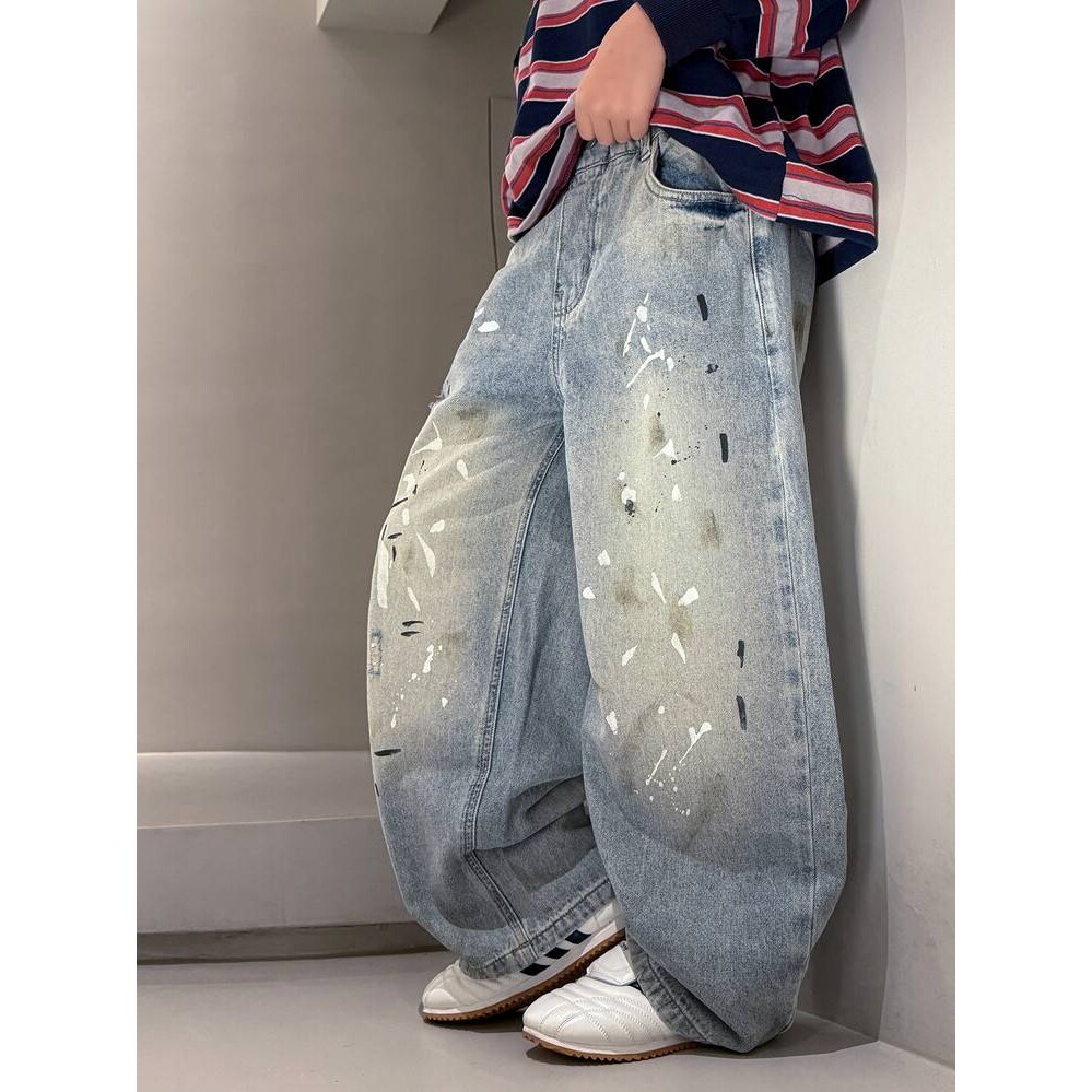 品牌专柜男童牛仔裤2026春款新款中大童时尚休闲泼墨长裤洋气宽松