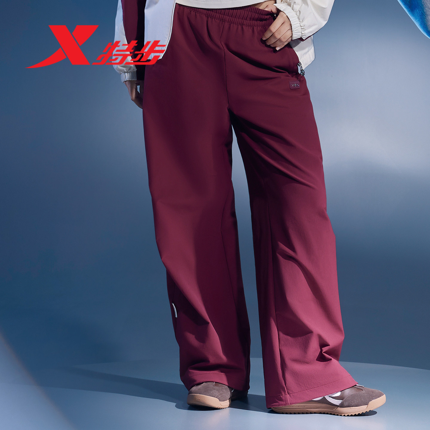 特步女裤运动裤降落伞裤2026春季新款阔腿裤梭织长裤974128560197