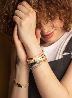 波西米亚风多层叠戴编织金珠手串