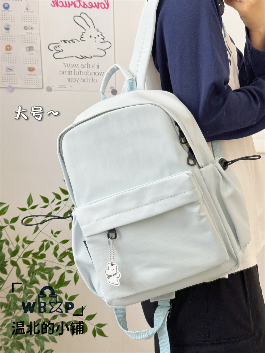 日系简约百搭纯色双肩包女初中高中大学生轻便书包韩版校园背包潮