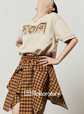 黄色半身裙女2026新款松紧腰格子不规则百搭设计感高腰短裙