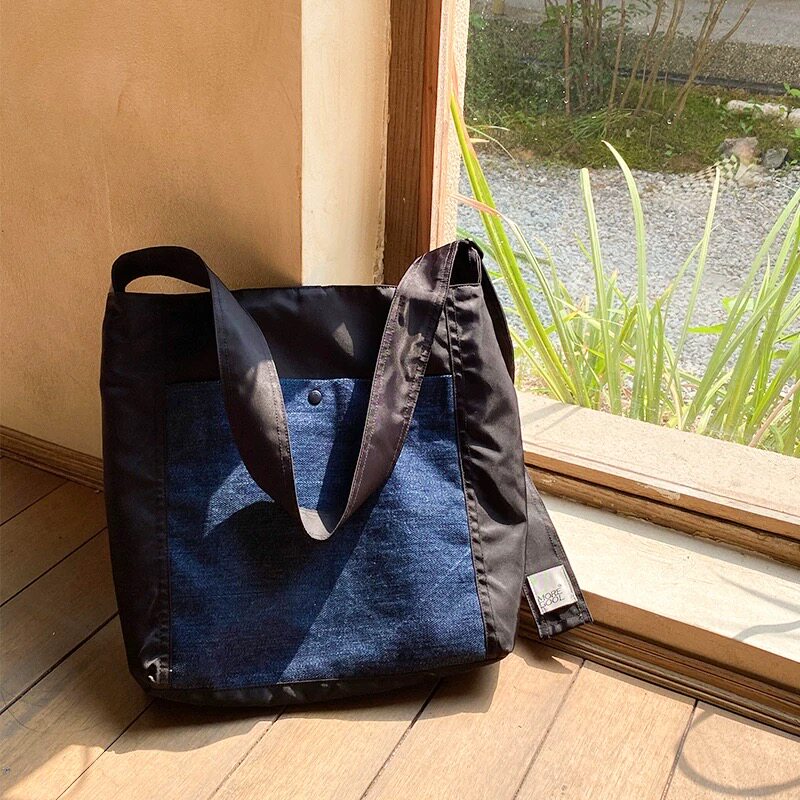 复古藏青色牛仔拼接单肩包2026新款大容量托特包简约文艺帆布包包