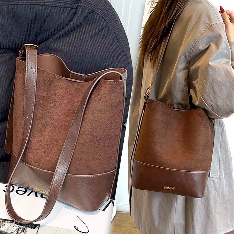 2026秋冬流行复古磨砂小包包新款女包通勤大容量百搭水桶包斜挎包,箱包皮具/热销女包/男包,水桶包,淘宝优惠券,粉丝福利购,淘宝优惠卷