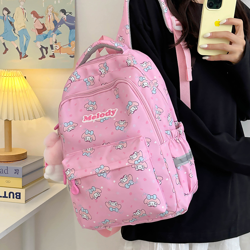 新款大容量百搭护脊轻便初中生小学生书包卡通可爱背包外出双肩包